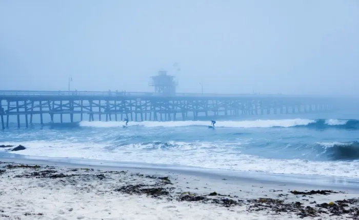 Framed Print : San Clemente pier with surfers on a foggy day, California, United States of America, North America