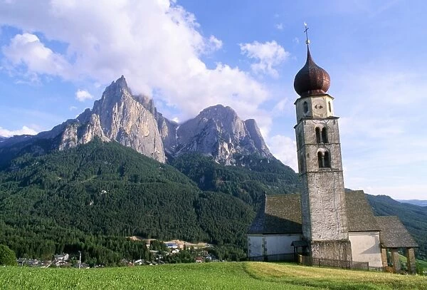 San Valentino Baroque church and peaks of Sciliar