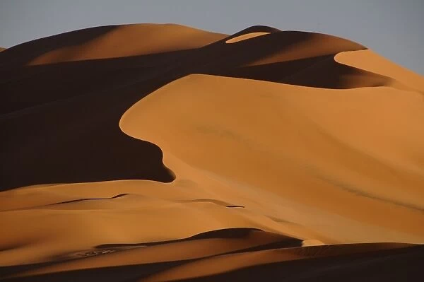 Sand dunes at sunset in the Sahara Desert, Libya, North Africa, Africa