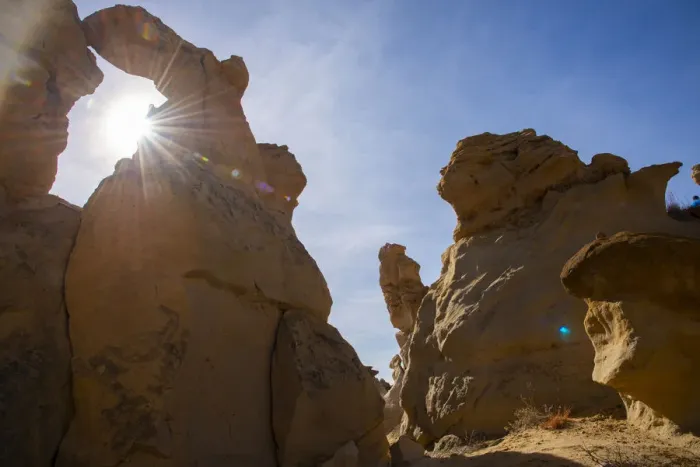 Framed Print : Sandstone sculptures and sun flare in Bisti / De-Na-Zin Wilderness in New Mexico Framed Print : Sandstone sculptures and sun flare in Bisti / De-Na-Zin Wilderness in New Mexico