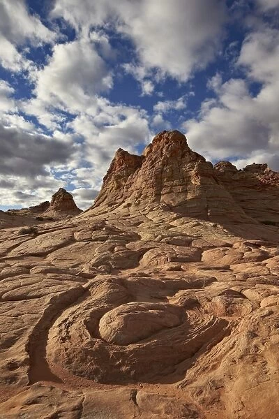 Sandstone swirl under clouds, Coyote Buttes Wilderness, Vermillion Cliffs National Monument, Arizona, United States of America, North America