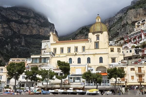 Santa Maria church and the colourful houses of Positano on the rugged hillside, Amalfi Coast (Costiera Amalfitana), UNESCO World Heritage Site, Campania, Italy, Mediterranean, Europe
