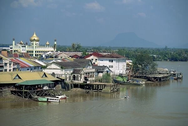 The Sarawak River with the State Mosque beyond at Kuching