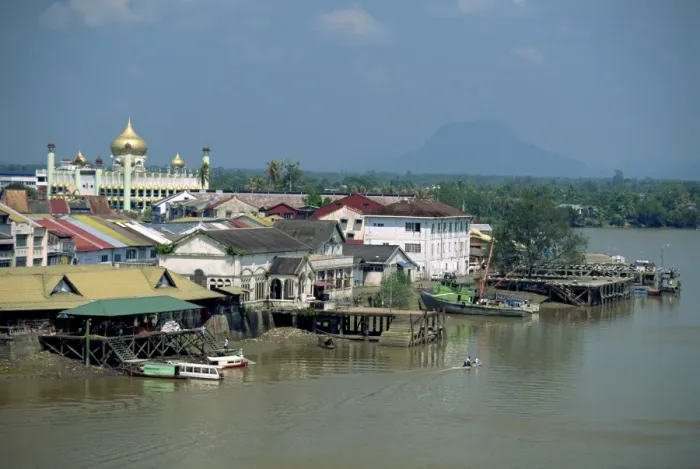 Framed Print : The Sarawak River with the State Mosque beyond at Kuching Framed Print : The Sarawak River with the State Mosque beyond at Kuching