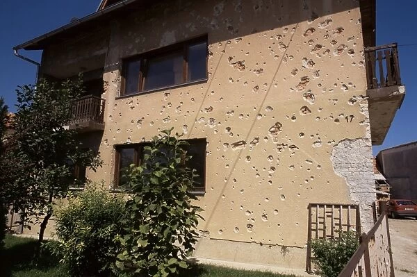 Scars of war on a house near Karlovac, Croatia, Europe
