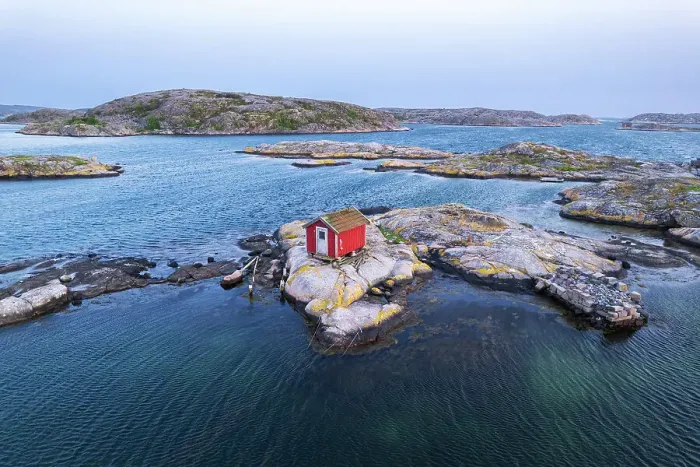 Framed Print : Scenic lonely wooden red house on a rocky island at dusk, Bohuslan, Sweden, Scandinavia, Europe Framed Print : Scenic lonely wooden red house on a rocky island at dusk, Bohuslan, Sweden, Scandinavia, Europe