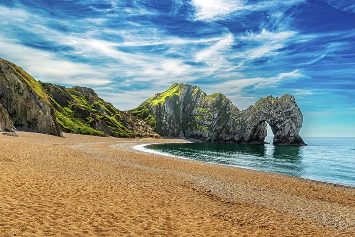 Framed Print : Scenic view of a beach with a large rock formation, clear blue sky, and calm sea at Durdle Door, Jurassic Coast, UNESCO World Heritage Site, Dorset, England, United Kingdom, Europe