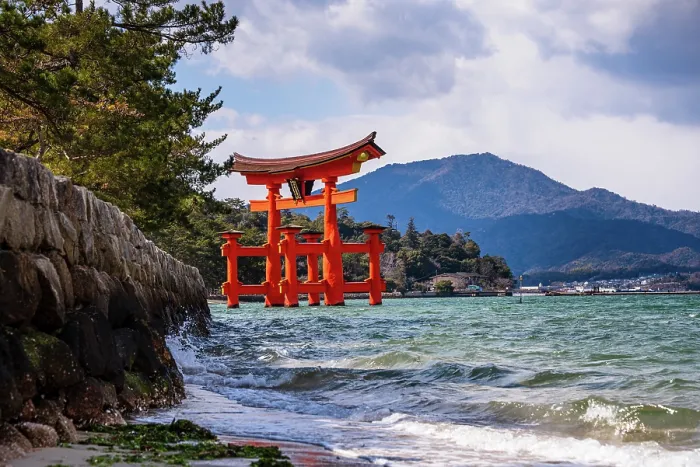 Framed Print : Scenic View of the Floating Torii Gate of Itsukushima Shrine from a Rocky Shoreline on Miyajima Island, Japan Framed Print : Scenic View of the Floating Torii Gate of Itsukushima Shrine from a Rocky Shoreline on Miyajima Island, Japan