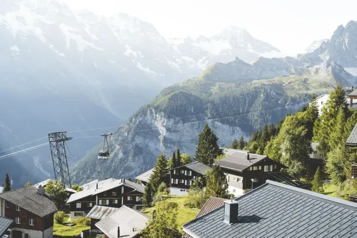 Framed Print : Schilthorn cableway passing over the alpine village of Murren, Jungfrau Region Framed Print : Schilthorn cableway passing over the alpine village of Murren, Jungfrau Region