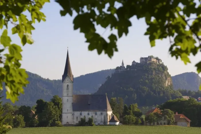 Framed Print : Schloss Hochosterwitz with village church, Carinthia, Austria Framed Print : Schloss Hochosterwitz with village church, Carinthia, Austria