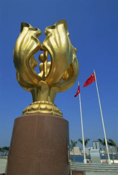 Framed Print : Sculpture and the Chinese flags flying at the Hong Kong Convention and Exhibition Centre Framed Print : Sculpture and the Chinese flags flying at the Hong Kong Convention and Exhibition Centre