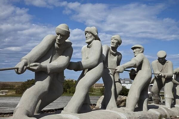 Sculpture of fishermen on island in the Gulf of St. Lawrence, Iles de la Madeleine