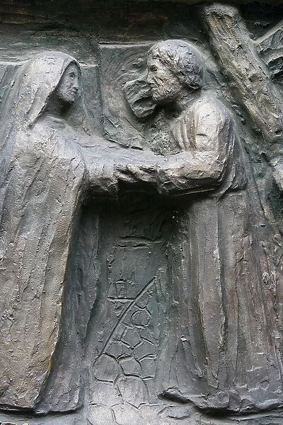 Sculpture of Jesus meeing his mother on the Via Dolorosa on the Notre Dame door