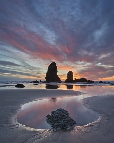 Sea stacks at sunset, Cannon Beach, Oregon, United States of America, North America