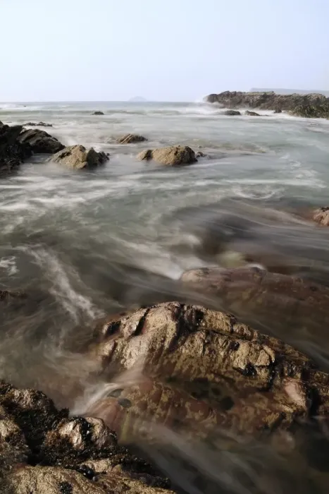 Framed Print : Sea swirling around rocks as tide rises, near Polzeath, Cornwall, England, United Kingdom, Europe Framed Print : Sea swirling around rocks as tide rises, near Polzeath, Cornwall, England, United Kingdom, Europe