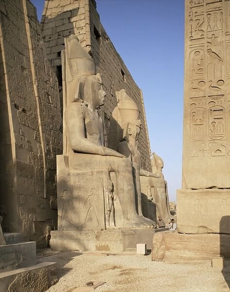 Seated colossi and base of obelisk, Luxor Temple, Thebes, UNESCO World Heritage Site