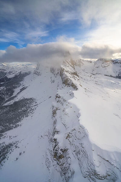 Seceda and Odle mountain range in winter, aerial view, Val Gardena, Dolomites