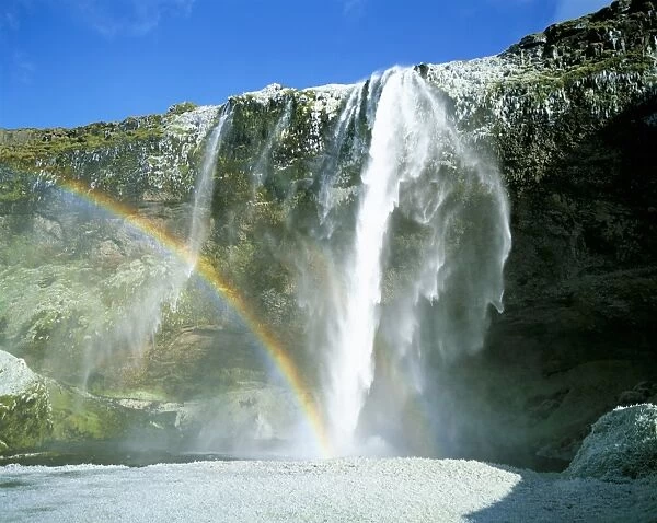 Seljalandsfoss waterfall and rainbow