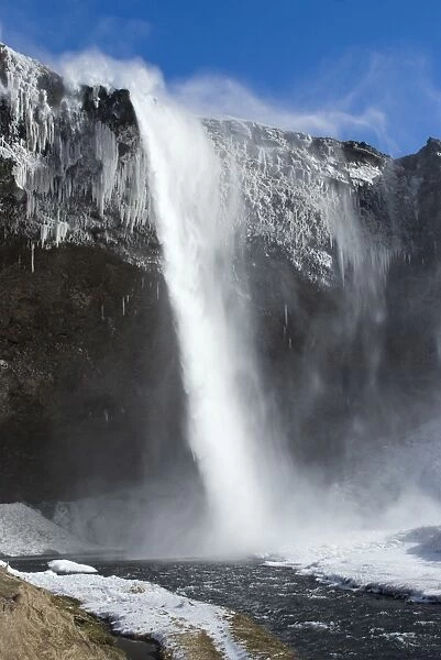 Seljalandsfoss waterfall in the snow, South Iceland, Iceland, Polar Regions