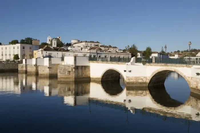 Framed Print : Seven arched Roman bridge and town on the Rio Gilao river, Tavira, Algarve, Portugal