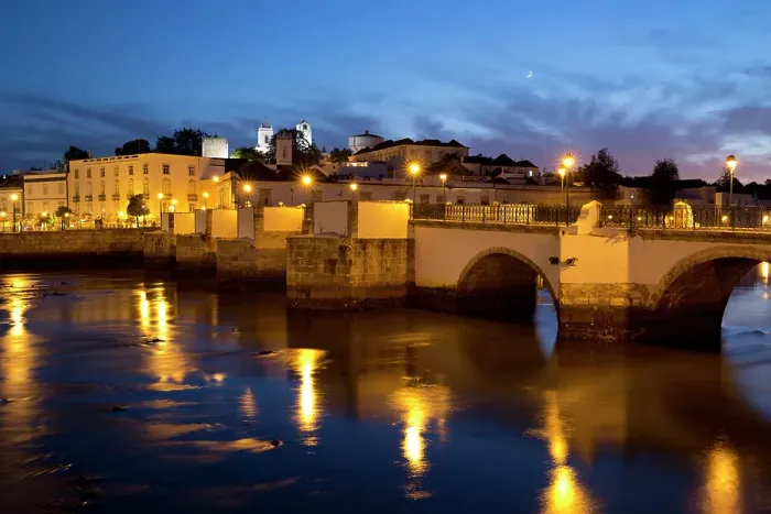 Framed Print : Seven arched Roman bridge and town on the Rio Gilao river at night, Tavira, Algarve Framed Print : Seven arched Roman bridge and town on the Rio Gilao river at night, Tavira, Algarve