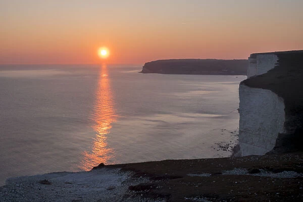 Seven Sisters chalk cliffs at sunset, South Downs National Park, East Sussex, England
