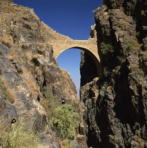 The Shahara Bridge over a rocky gorge