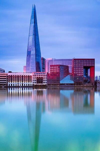The Shard reflecting in the River Thames at sunrise, London, England, United Kingdom