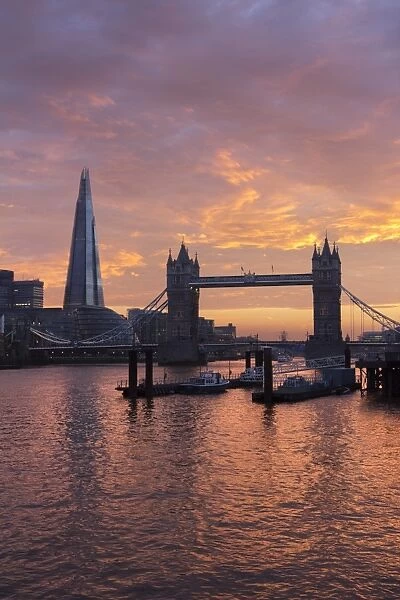 The Shard and Tower Bridge on the River Thames at sunset, London, England, United Kingdom, Europe