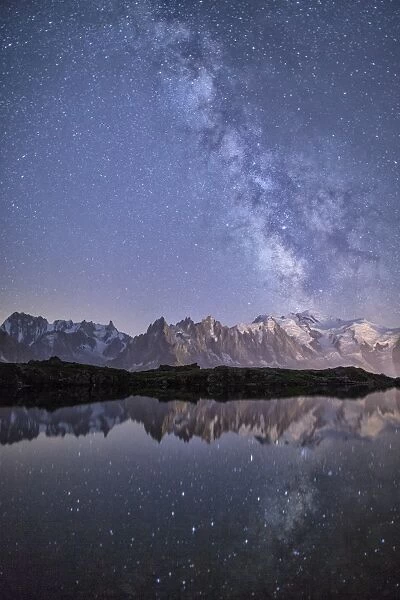 A sharp Milky Way on a starry night at Lac des Cheserys with Mont Blanc, Europes highest peak