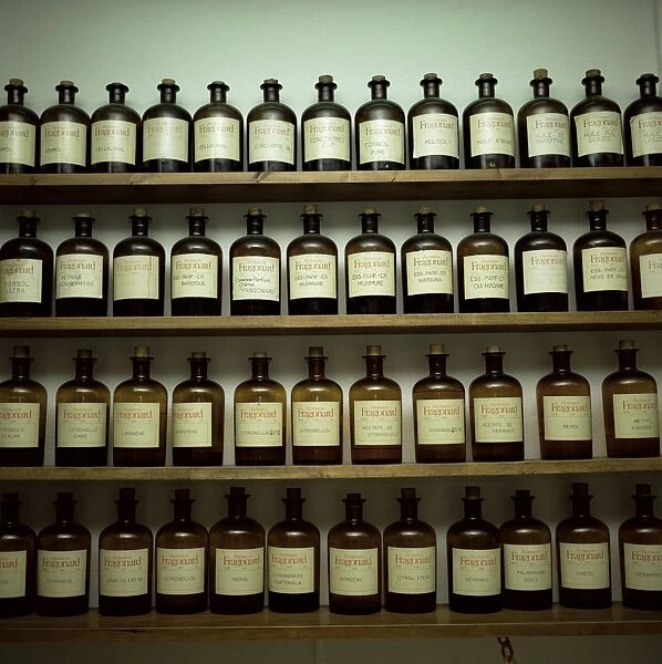 Shelves of old essence bottles, Parfumerie Fragonard, Grasse, Alpes Maritimes