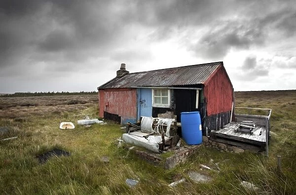 Shieling, a building once used as temporary summer accommodation by farmers while grazing their livestock on common land, off the Pentland Road, near Carloway, Isle of Lewis, Outer Hebrides, Scotland
