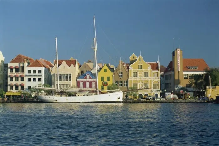Framed Print : Ships moored in front of the colonial gabled waterfront Framed Print : Ships moored in front of the colonial gabled waterfront