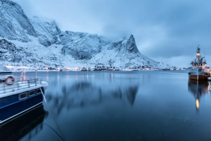 Framed Print : Ships moored in the small harbor of Reine under a gloomy sky in the south of the Lofoten Islands, Arctic, Norway, Scandinavia, Europe