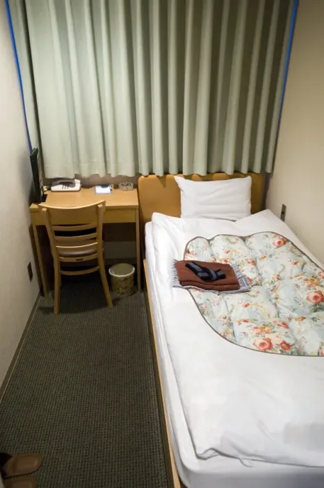 Framed Print : A shoebox-sized hotel room less than two metres wide and costing 8, 000 Yen ($80 Framed Print : A shoebox-sized hotel room less than two metres wide and costing 8, 000 Yen ($80