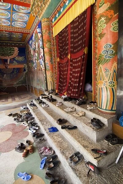Shoes outside prayer room, Nanwu temple, Kangding, Sichuan, China, Asia
