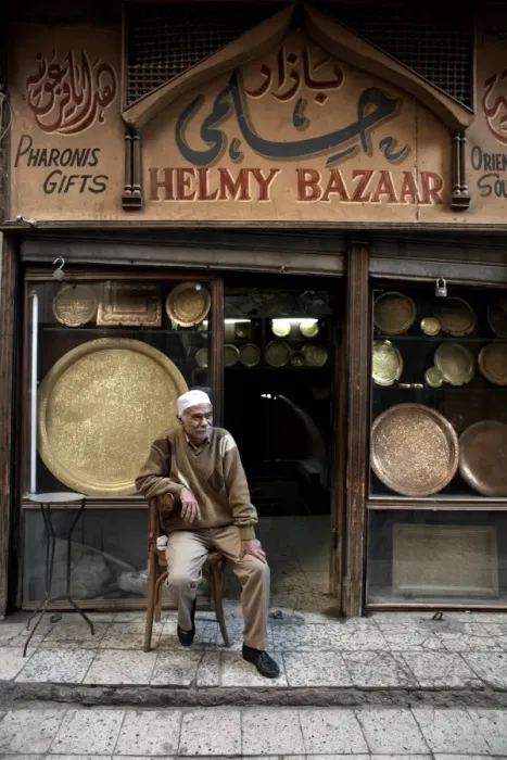 Framed Print : Shop owner relaxes in the great bazaar of Khan al-Khalili, Cairo, Egypt, Africa Framed Print : Shop owner relaxes in the great bazaar of Khan al-Khalili, Cairo, Egypt, Africa