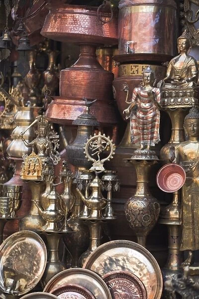 Shop selling brassware in street bazaar, Kathmandu, Nepal, Asia
