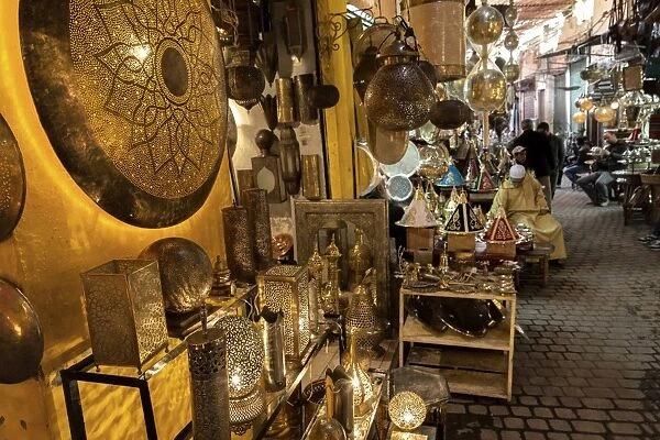 Shop selling traditional metal lamps and trays in the souks, Marrakech, Morocco, North Africa, Africa