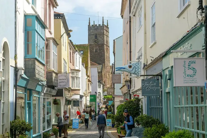 Framed Print : Shops in historic buildings along alleyway with tower of church of St. Saviour, Foss Street, Dartmouth, Devon, England, United Kingdom, Europe Framed Print : Shops in historic buildings along alleyway with tower of church of St. Saviour, Foss Street, Dartmouth, Devon, England, United Kingdom, Europe
