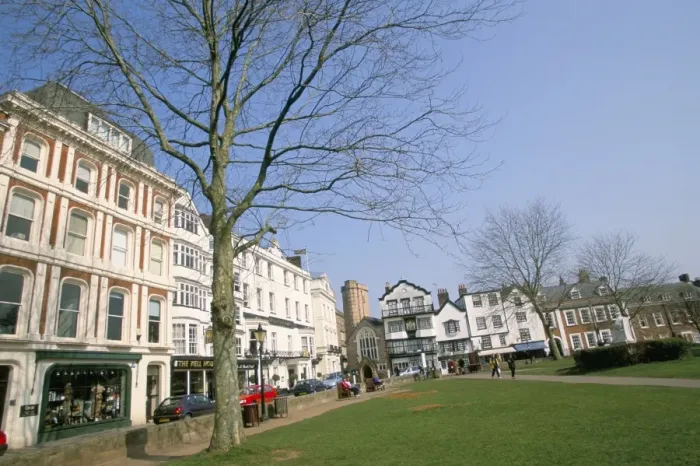 Framed Print : Shops and restaurants, Cathedral Green, Exeter, Devon, England, United Kingdom, Europe Framed Print : Shops and restaurants, Cathedral Green, Exeter, Devon, England, United Kingdom, Europe