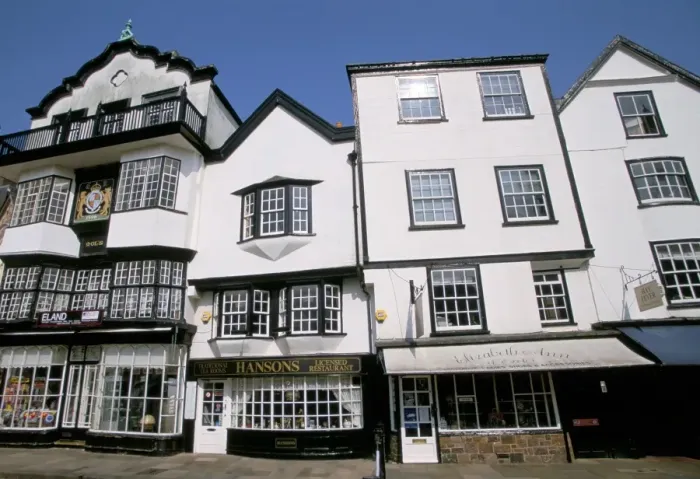 Framed Print : Shops in Tudor buildings, Cathedral Green, Exeter, Devon, England, United Kingdom, Europe Framed Print : Shops in Tudor buildings, Cathedral Green, Exeter, Devon, England, United Kingdom, Europe