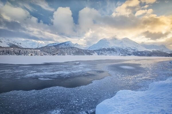 The shore of the frozen Lake Sils, Upper Engadine, Canton of Grisons (Graubunden)