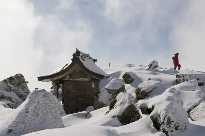 Framed Print : Shrine and climber on snow covered Iwaki San mountain, Aomori prefecture, Japan, Asia