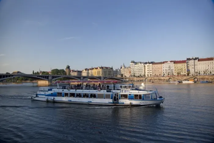 Framed Print : Sightseeing boat on Vltava River with East bank and Jiraskuv Bridge, Prague Framed Print : Sightseeing boat on Vltava River with East bank and Jiraskuv Bridge, Prague