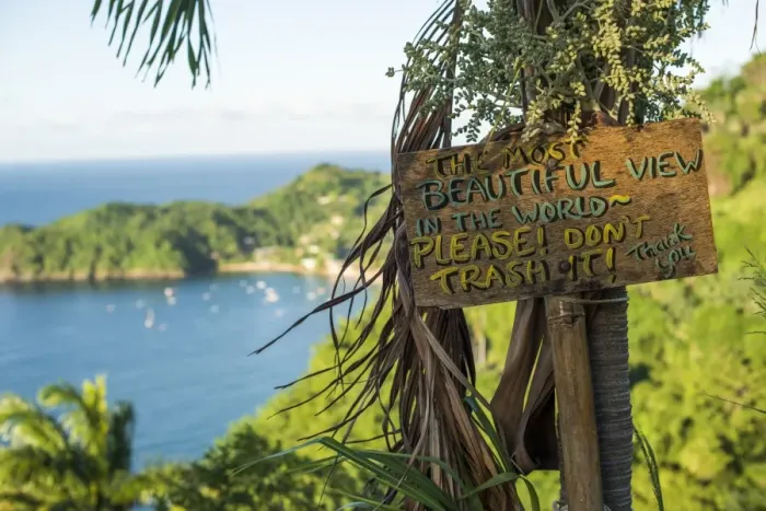 Framed Print : A sign asking readers not to trash the most beautiful view in the world at Castara Bay in Tobago Framed Print : A sign asking readers not to trash the most beautiful view in the world at Castara Bay in Tobago