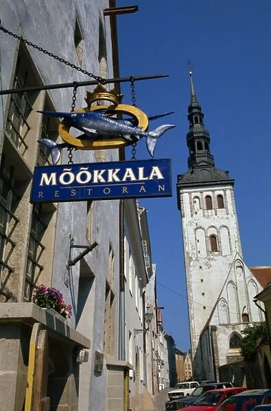 Sign for the Mookkala Restaurant with the Niguliste Church behind, Old Town