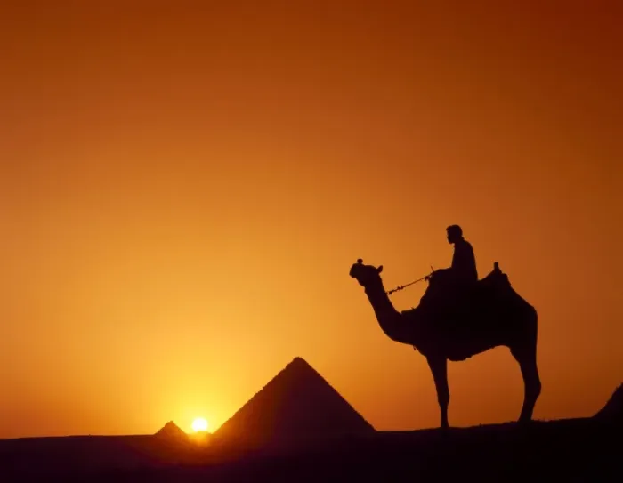 Framed Print : Silhouette of figure on camelback at pyramid, Giza, Cairo, Egypt Framed Print : Silhouette of figure on camelback at pyramid, Giza, Cairo, Egypt