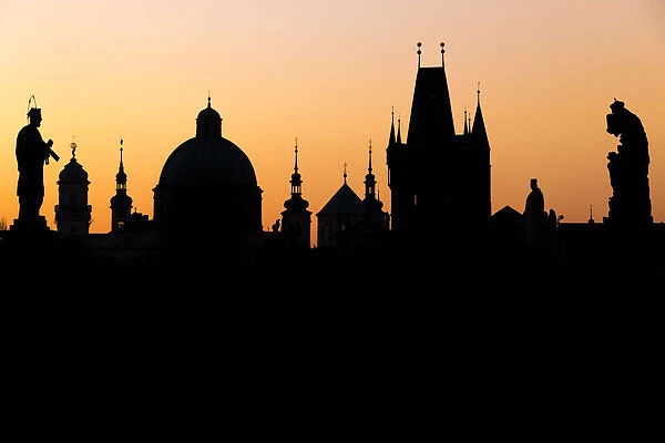 Silhouette of the old town buildings seen from Charles Bridge at sunrise, UNESCO World