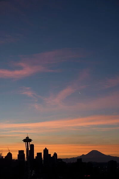 Silhouette of Seattle skyline with moon and Mount Rainier in distance, taken from Kerry Park, Seattle, Washington State, United States of America, North America